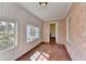 Sunroom featuring decorative walls and windows to the exterior and a view into the house at 1926 N Decatur Ne Rd, Atlanta, GA 30307
