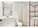 Clean and simple bathroom featuring a vanity, toilet, and shower with a curtain at 3651 Princeton Ave, Atlanta, GA 30337