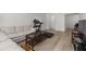 Spacious living room features hardwood floors, ample seating and a modern entertainment center at 6851 Roswell Rd # L1, Atlanta, GA 30328