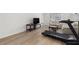 Bright living room featuring hardwood floors, a modern ceiling fan and lots of natural light at 6851 Roswell Rd # L1, Atlanta, GA 30328