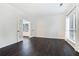 Bright office space featuring hardwood floors, French doors, and large windows providing natural light at 725 Victoria Station Blvd, Lawrenceville, GA 30043
