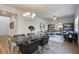 Open living space featuring a glass dining table, wood floors, and modern decor at 746 River Gardens Dr Se # 746 River Gardens Dr Se, Atlanta, GA 30354