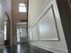 Bright foyer with decorative trim and hardwood floors at 15 Blanket Pass, Covington, GA 30016