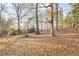 A spacious backyard offers an oasis of privacy and serenity at 1729 Norden Rd, Riverdale, GA 30296