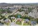 Aerial view of a neighborhood with mature trees and well-maintained homes in a suburban setting at 2571 Weddington Ne Rdg, Marietta, GA 30068