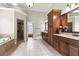 Primary bath with soaking tub, granite counters, and a separate tiled glass shower at 2571 Weddington Ne Rdg, Marietta, GA 30068