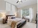 Bedroom with a ceiling fan, a window and sitting bench at 2571 Weddington Ne Rdg, Marietta, GA 30068