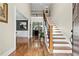 Elegant foyer with hardwood floors, staircase and views into dining and living rooms at 2571 Weddington Ne Rdg, Marietta, GA 30068