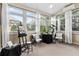 Bright and airy sunroom with ample windows, seating, and space for hobbies at 2571 Weddington Ne Rdg, Marietta, GA 30068