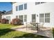 Backyard with a patio and green space, perfect for outdoor living at 3125 Crooked Stick Dr, Cumming, GA 30041