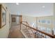 Bright second floor hallway featuring lots of natural light at 3125 Crooked Stick Dr, Cumming, GA 30041