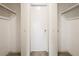 Spacious walk-in closet with shelving and neutral paint, ready for custom organization at 14 Muncy Se Ct, Smyrna, GA 30080