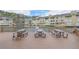 Spacious deck with picnic tables overlooking the lake, great for outdoor dining and gatherings at 14 Muncy Se Ct, Smyrna, GA 30080