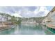 Beautiful waterfront community featuring a clubhouse and manicured landscaping at 14 Muncy Se Ct, Smyrna, GA 30080