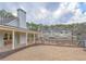 Community clubhouse with a waterfront view offering benches and picnic areas for residents at 14 Muncy Se Ct, Smyrna, GA 30080