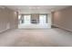 Bright living room featuring a mirrored wall, fireplace, and an open layout, creating a spacious and inviting atmosphere at 14 Muncy Se Ct, Smyrna, GA 30080