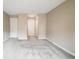 Spacious room featuring carpeted floors and neutral colored walls at 14 Muncy Se Ct, Smyrna, GA 30080