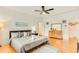 A beautifully staged bedroom features hardwood floors and light-colored walls at 1408 Aramore Dr, Conyers, GA 30013