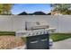 High-end grill with a spacious countertop on the patio surrounded by a privacy fence at 1408 Aramore Dr, Conyers, GA 30013