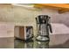 Kitchen counter featuring a coffee maker and toaster, perfect for the morning at 1408 Aramore Dr, Conyers, GA 30013