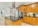Well-equipped kitchen with stainless steel appliances and a stylish central island at 1408 Aramore Dr, Conyers, GA 30013