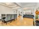 Open living space showcasing a fireplace, built-in shelving, and hardwood floors at 1408 Aramore Dr, Conyers, GA 30013