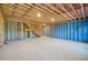 This unfinished basement features visible insulation and a support beam at 3900 Allegretto Cir # 51, Atlanta, GA 30339