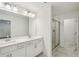 A bathroom with double sinks, and a glass shower at 3900 Allegretto Cir # 51, Atlanta, GA 30339