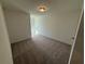 Neutral bedroom with a window, tan carpet, and neutral walls at 3900 Allegretto Cir # 51, Atlanta, GA 30339