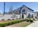 Attractive community entrance with signage, landscaping, and well-maintained buildings at 3900 Allegretto Cir # 51, Atlanta, GA 30339