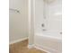 Clean bathroom features a bathtub/shower combination with white tile and a showerhead at 4273 High Park Ln # 15, Atlanta, GA 30344