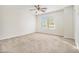 Bright bedroom with a large window offering plenty of natural light and neutral carpet at 4273 High Park Ln # 15, Atlanta, GA 30344