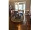 Spacious dining room with bay window and hardwood floors, perfect for Gathering gatherings at 222 Waterford Cove Dr, Suwanee, GA 30024