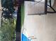 Outdoor pool area featuring a table, umbrella, concrete patio, and privacy landscaping at 222 Waterford Cove Dr, Suwanee, GA 30024