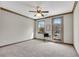 Versatile bedroom with neutral walls, carpet floors, and a private balcony with views of the neighborhood at 2318 Willington Shoals Se Pl, Smyrna, GA 30080