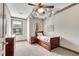 Charming bedroom with a unique ceiling design, wood floors, and a built-in bedside table at 2318 Willington Shoals Se Pl, Smyrna, GA 30080