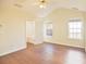 Bright bedroom with vaulted ceiling, ceiling fan, and hardwood flooring at 3165 Bellestone Ct, Marietta, GA 30066