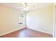 Bedroom featuring a single window with a view of the outdoors and hardwood flooring at 3165 Bellestone Ct, Marietta, GA 30066