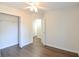 Bedroom with hardwood floors, an open closet, and views into other rooms at 3165 Bellestone Ct, Marietta, GA 30066