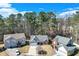 Beautiful aerial view of a well-maintained home in a serene, tree-lined neighborhood at 1640 Racquet Club Cir, Lawrenceville, GA 30043