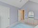 Bedroom with vaulted ceiling, mirror, and ample dresser storage at 1640 Racquet Club Cir, Lawrenceville, GA 30043
