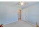 Simple bedroom with neutral walls and ample closet space at 1640 Racquet Club Cir, Lawrenceville, GA 30043