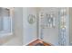 Bright entryway featuring decorative door glass and hardwood floors at 1640 Racquet Club Cir, Lawrenceville, GA 30043