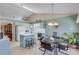 Cozy kitchen with dining nook, light blue cabinetry, and natural light at 1640 Racquet Club Cir, Lawrenceville, GA 30043