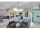 Eat-in kitchen with blue cabinetry, island, and views to living areas at 1640 Racquet Club Cir, Lawrenceville, GA 30043