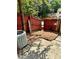 The backyard features a fenced perimeter and pine straw ground cover at 2574 Stratford Ln, Morrow, GA 30260