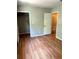 Bedroom with open closet and access to another room; great natural light at 2574 Stratford Ln, Morrow, GA 30260