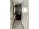 Hallway with white doors and view to stairs at 2574 Stratford Ln, Morrow, GA 30260