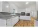 Bright kitchen with granite countertops, stainless steel appliances, and ample cabinet space at 4647 Wonder Valley Trl, Decatur, GA 30034