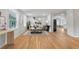 Bright living room showcasing hardwood floors, a modern sofa, and large windows providing ample natural light at 4647 Wonder Valley Trl, Decatur, GA 30034